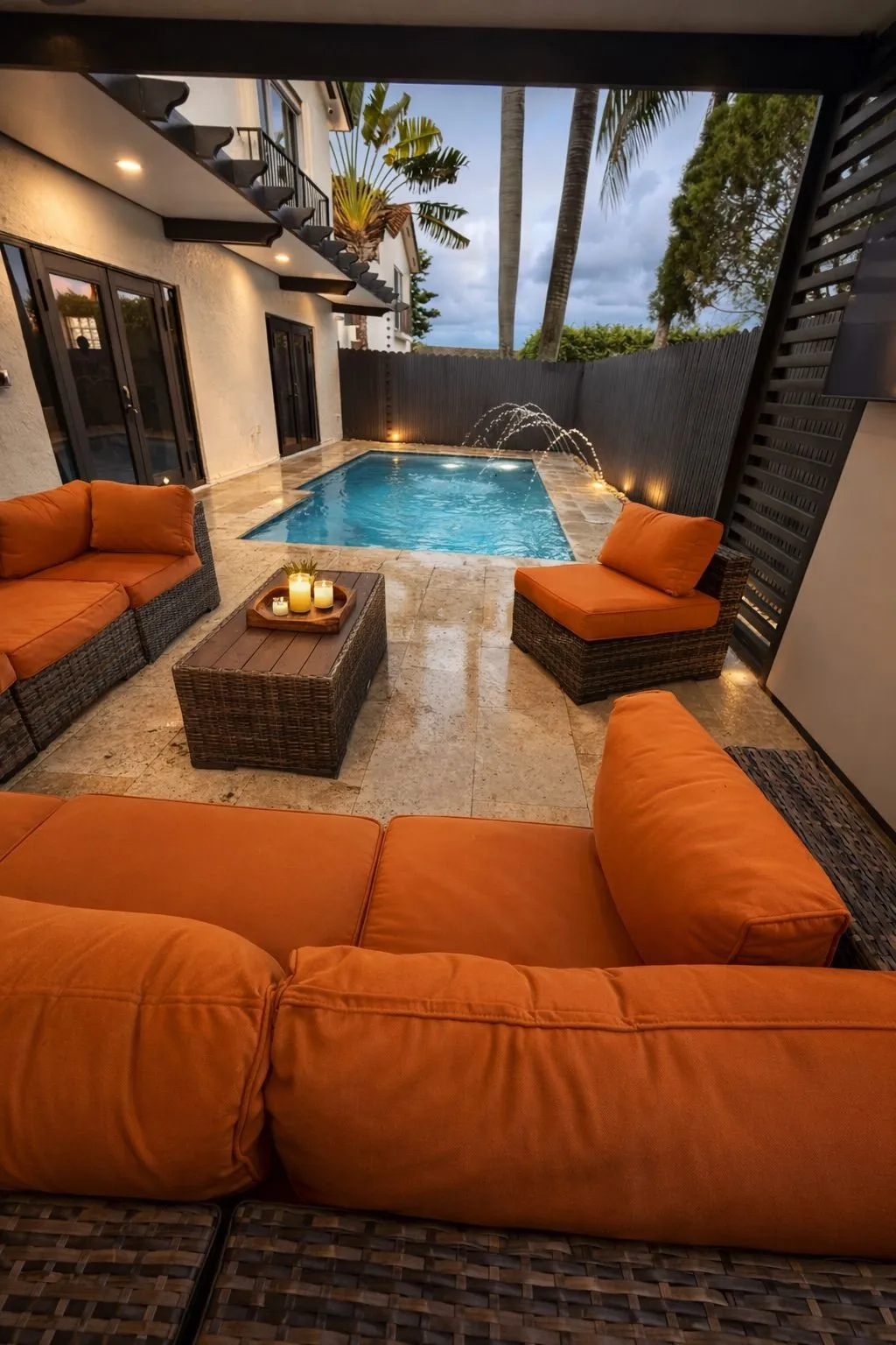 Villa Star — lit pool and lounge at night